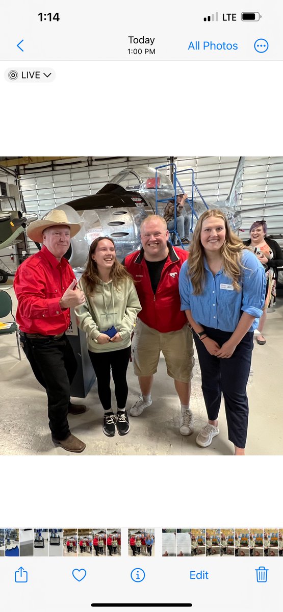 Sasha Shewchuk, 14, in Grade 9 at St. Elizabeth Seton, won best overall (Quality for People with Disabilities) of 90 displays at Calgary and Central Alberta School Fair on Thursday at the Hangar Flight Museum. With Sasha are organizers Rob Lennard, Tom Elder, Brooke Campbell.