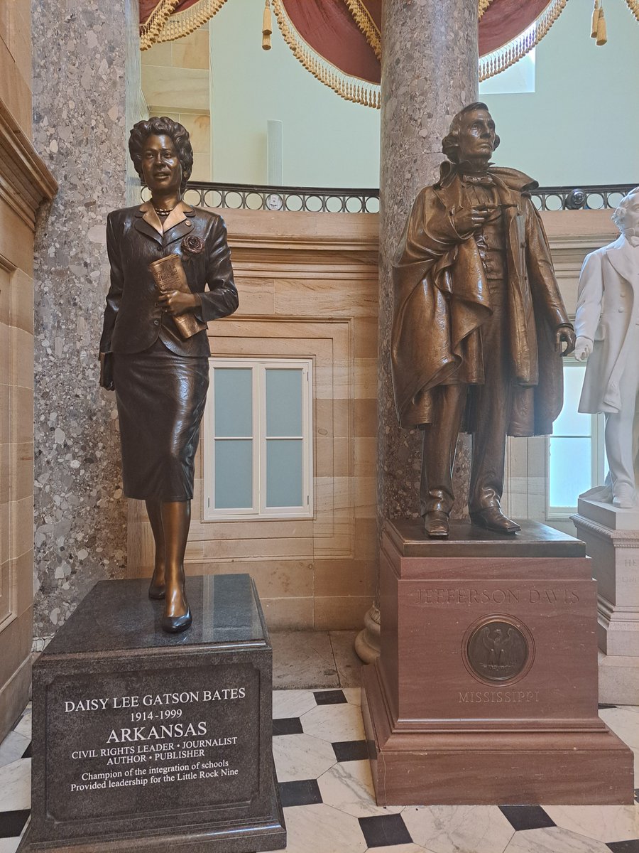Interesting placement of the newly arrived and beautiful statue of American civil rights activist Daisy Bates of Arkansas in National Statuary Hall in the Capitol -- right next to the statue of Jefferson Davis.