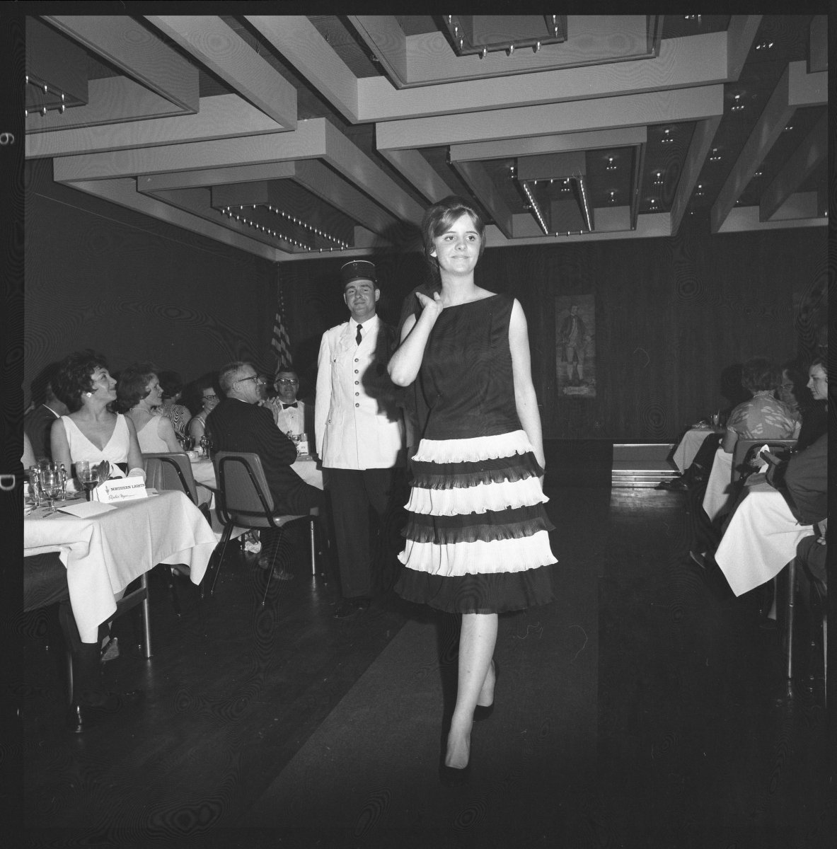 July 20, 1965 fashion show in the Discovery Room of the Hotel Captain Cook in Anchorage, featuring the work of Anchorage designer Betty Crouch. Via Anchorage Museum. #alaskahistory #alaska #anchoragehistory