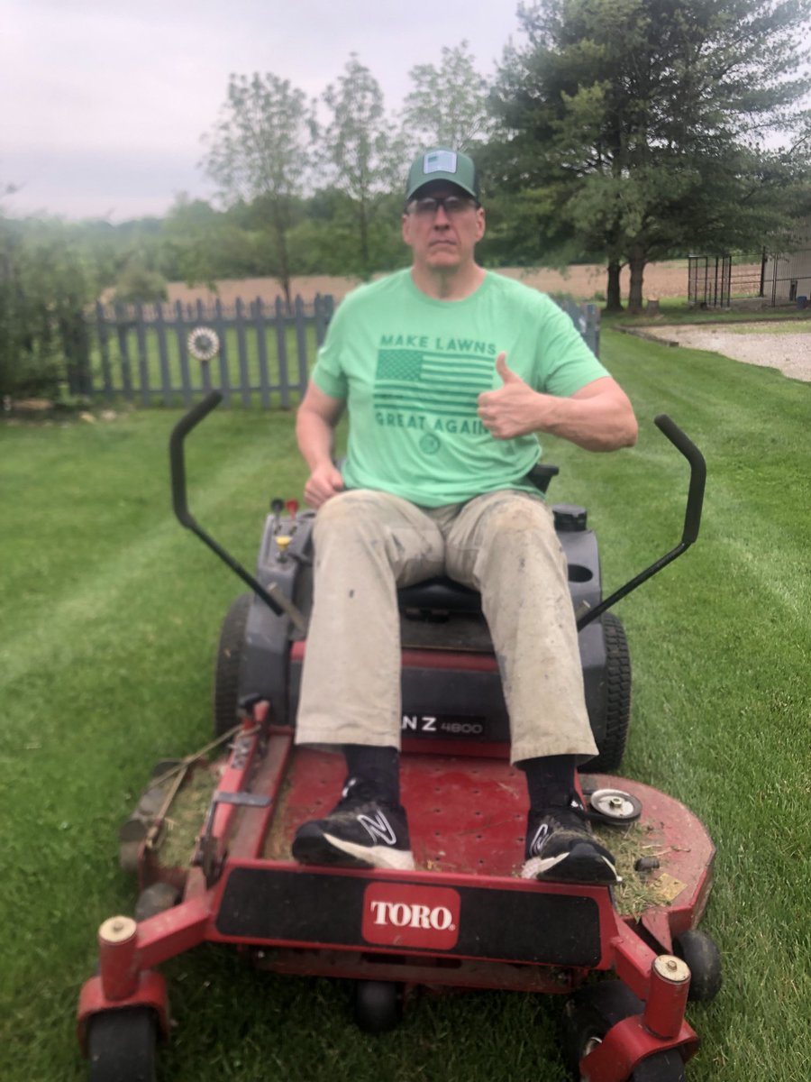 Proud to wear the new ⁦@OutKickTNML⁩ swag! With a little help from my nephew was able to get the lawn done before the rain started! Well done! My white pines are dying off and I’m replacing them with arborvitae. Beer this week is ⁦@foundersbrewing⁩ barrel runner.