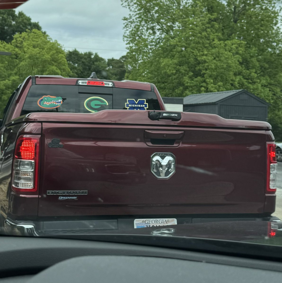 I’m truly bafoozled by his window stickers. I mean a person can be a fan of a team I don’t like but the Power G looks nothing like Green Bay nor the color of UGA and cmon UF and UM????😂