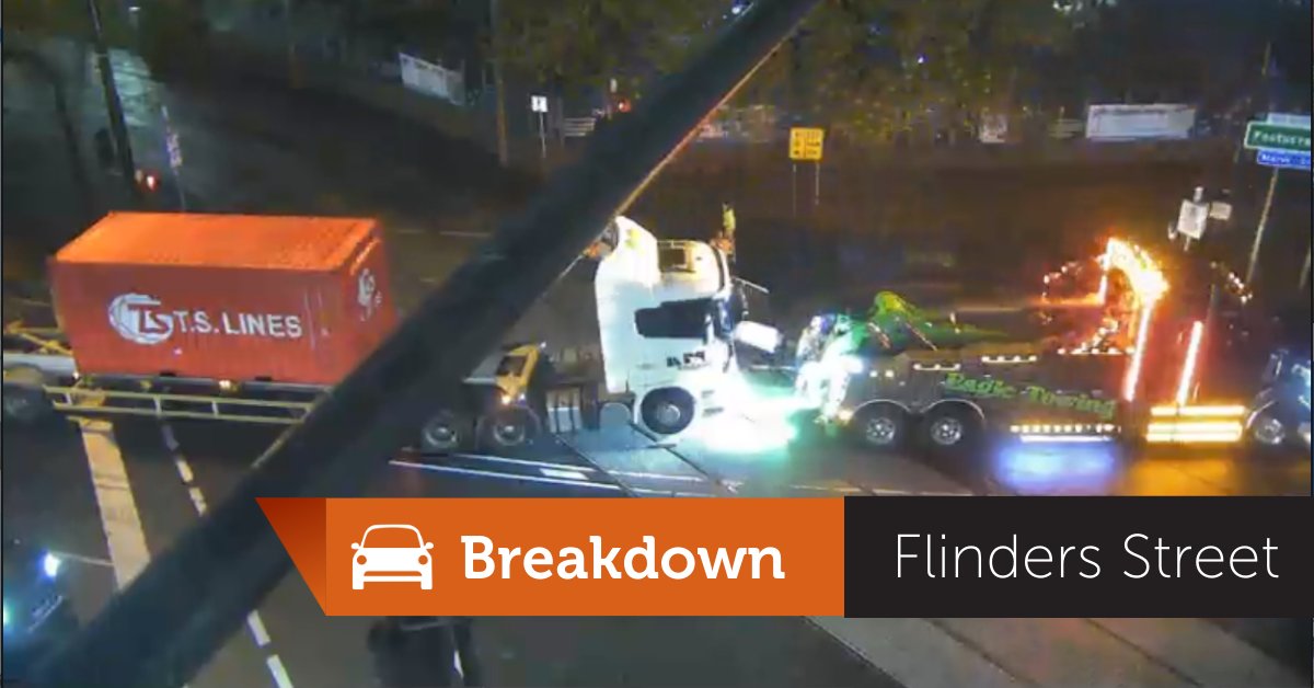 Left lane blocked westbound on Flinders Street, Docklands at the Wurundjeri Way intersection, due to a truck breakdown. Heavy haulage towing is working to remove the truck from the road. Tram services on routes 70 and 75 are also affected. #victraffic