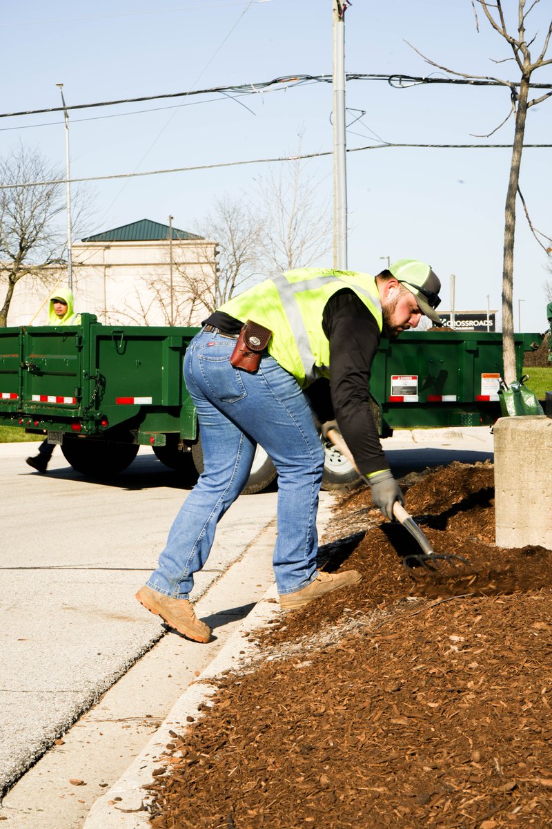 Let's prep those plant beds for a burst of color! Our crew is rolling up their sleeves for some serious gardening magic. Who's ready to dig in? 🌱💫 #GardenGurus #PlantBedPrep #BloomingSeason