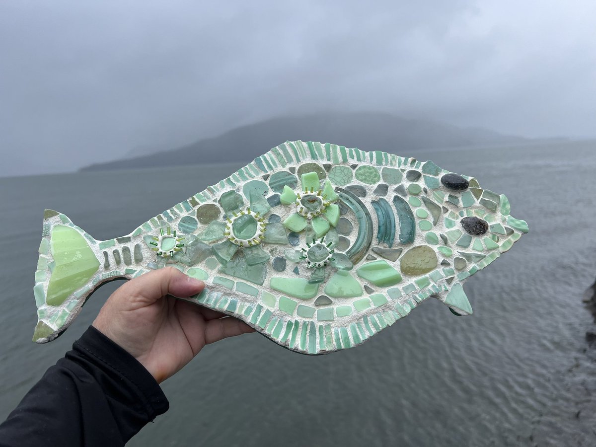 I’m liking mosaic art. It’s not easy though. Made a halibut! Using pottery & glass I found on our island’s old garbage dump beach. The sea-green glass is old cocoa cola bottles. And the sea-green pottery is broken jadeite dishes. 

#Alaska #Alaskan #mosaicart #recycledart