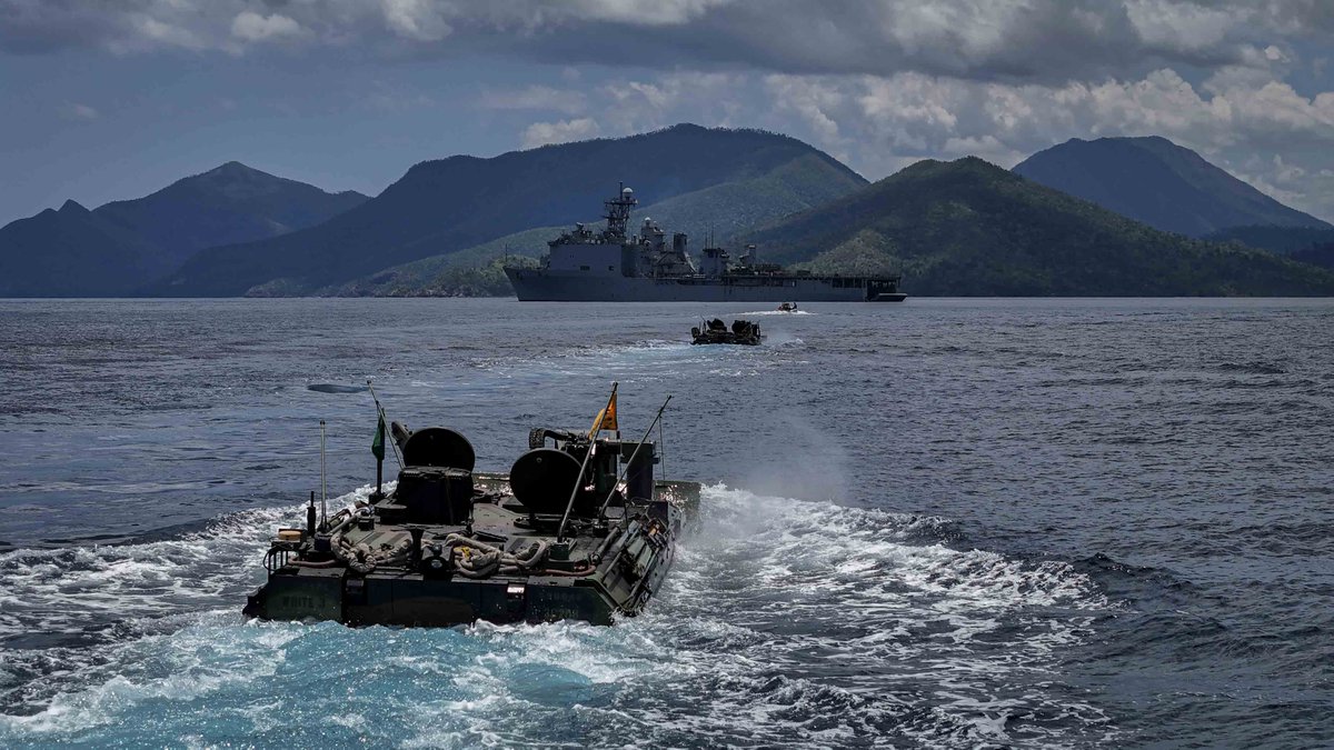 U.S. Marine Corps amphibious combat vehicles attached to Battalion Landing Team 1/5, 15th Marine Expeditionary Unit, conduct waterborne operations from the well deck of amphibious dock landing ship USS Harpers Ferry (LSD 49), in support of Exercise Balikatan 24, May 4.
