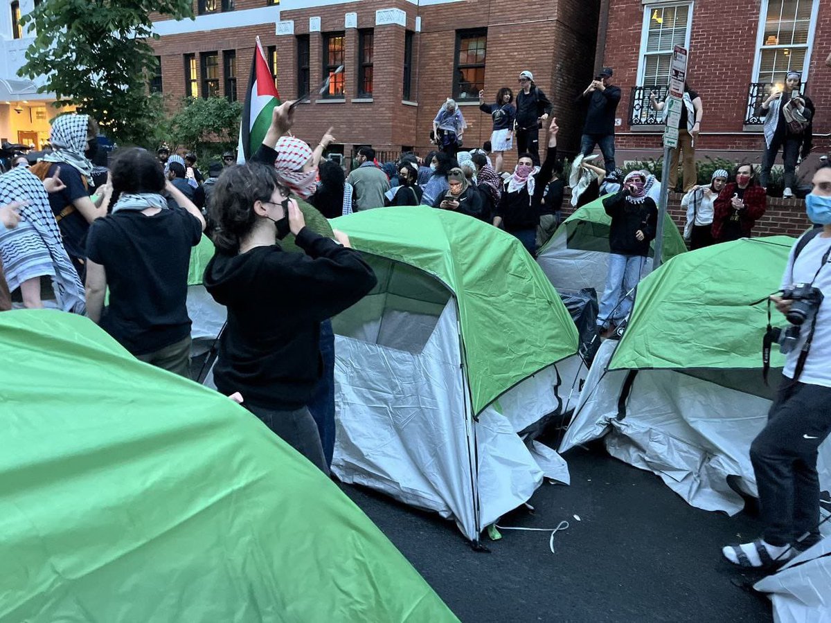 Photos from a new encampment supporting Palestine in the vicinity of George Washington University.
