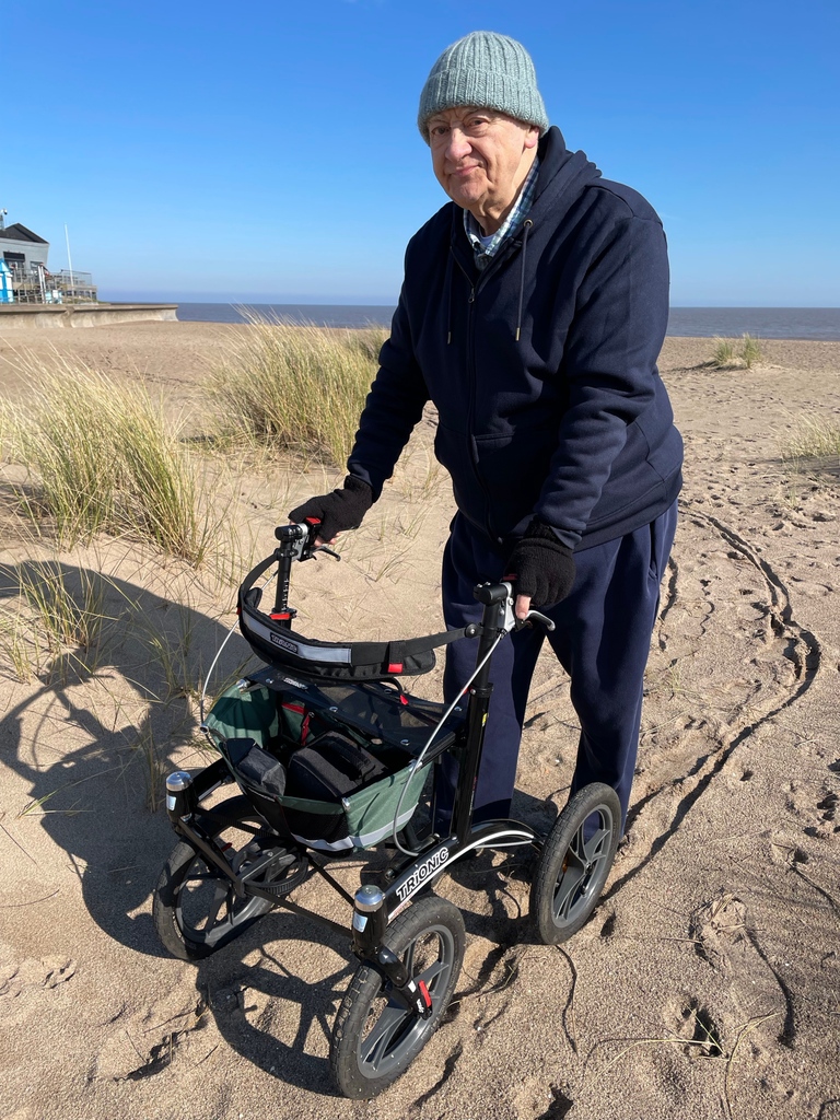 The sandy shores of Chapel Point provide the scenery for Jeff's leisurely stroll in this photograph.

#Veloped #Trionic #Walker #rollator #trionicexperience