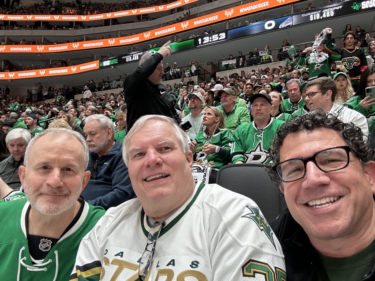 TMA Past President, Treasurer and Chair helping cheer in the Stars!