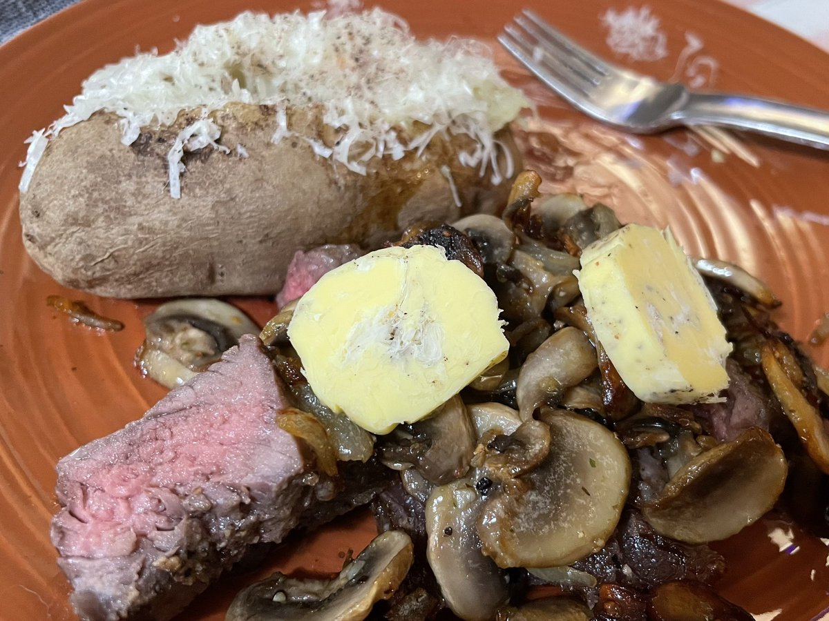 Hihihi. Kid made steak with sautéed mushrooms and Parmesan black pepper butter. Doggies had Parmesan and steak shares!