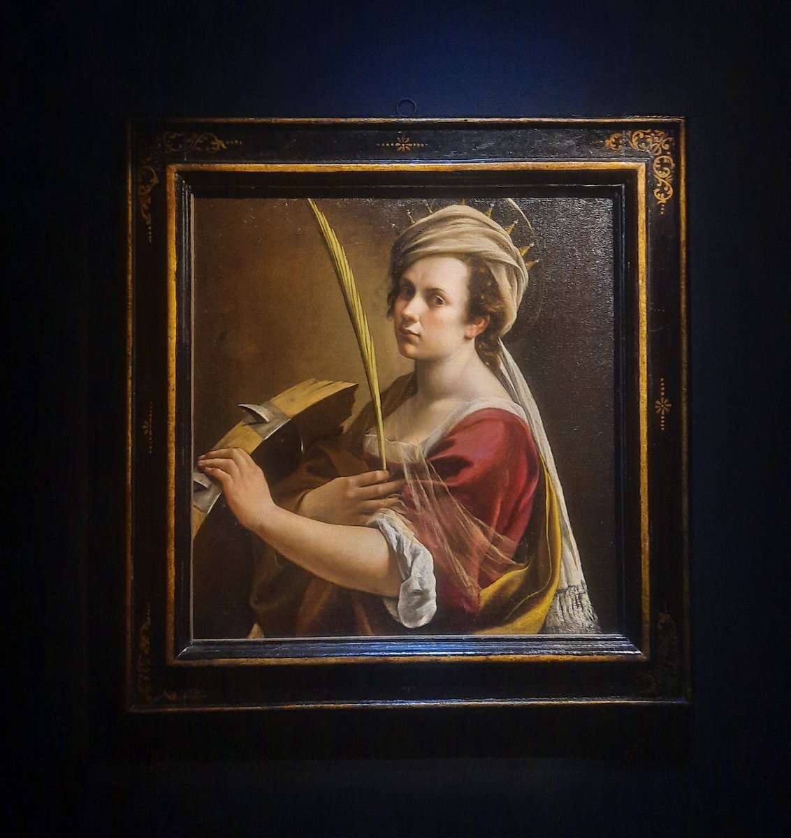 Artemisia Gentileschi has arrived @ikongallery, where she emerges from the darkness in 'Self-Portrait as Saint Catherine of Alexandria', clutching a palm frond, symbolic of martyrdom. Such spectacle!