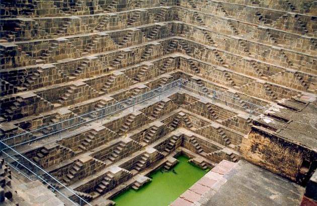 Chand Baori, a famous stepwell situated in the village of Abhaneri, Rajasthan, India. Constructed in 800 BC.