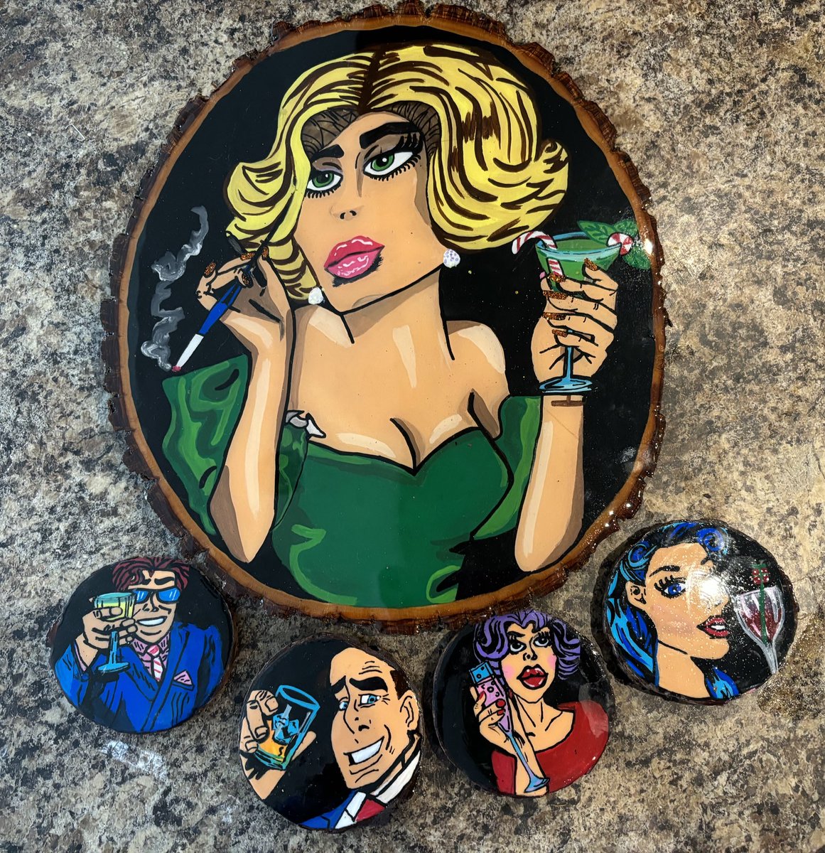 Handmade and painted epoxy resin art on Live Edgewood cookies.  Epoxy resin can withstand hot and cold temperatures for your beverages and entertainment purposes #handmade #art #artist #coasters #rusticdecor #epoxyresin #homedecor #popart #artisan #charcuterie #liveedge #painting