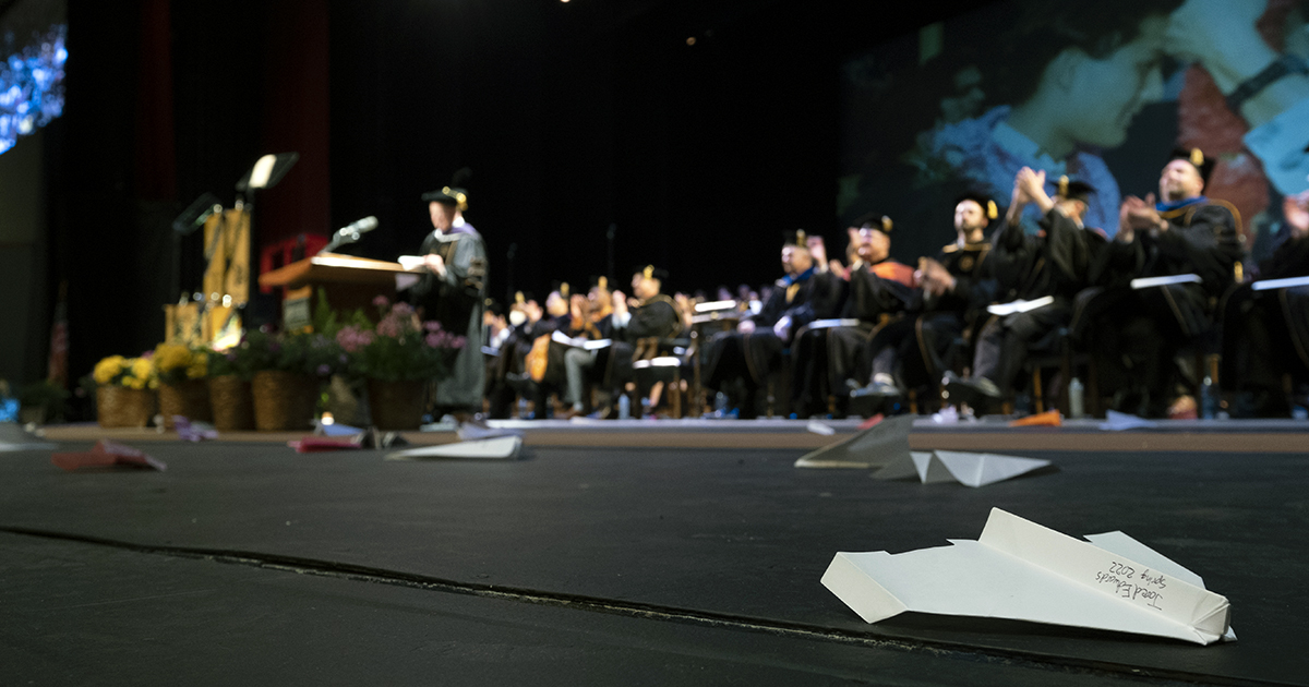 Elliott Hall of Music's stage will be bombarded with paper airplanes at some point during Saturday's @LifeAtPurdue evening commencement session. It's become a tradition for graduating seniors in @PurdueAeroAstro. Learn more in Inside Purdue Engineering: bit.ly/IPE-paperairpl…