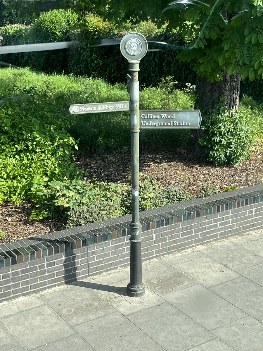 Historical sign to Merton Abbey viewed from a 57 bus for #FingerpostFriday