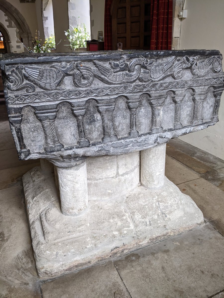 In All Saints church, East Meon - one of the Tournai marble fonts. I adore the dragons and the added ladybird. #FontsOnFriday