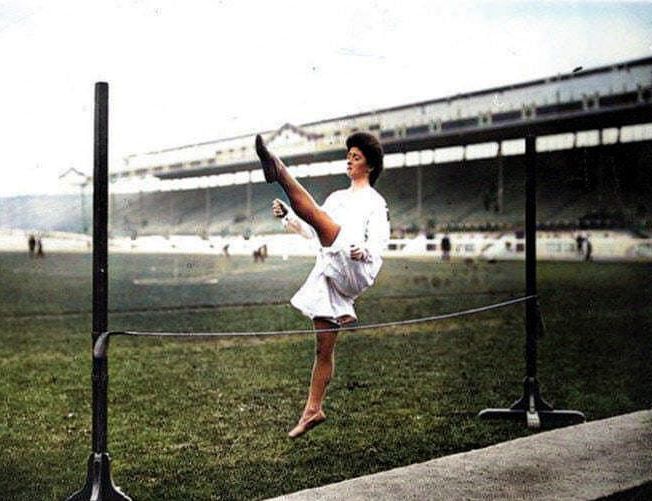 A lady competes in the high jump at the London Olympics in 1908. #londonolympics #olympicgames #1900s #highjump #colourised