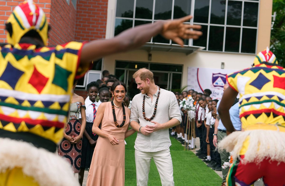 Prince Harry and Meghan visit children at the Lights Academy in Abuja, Nigeria,

Pic AP