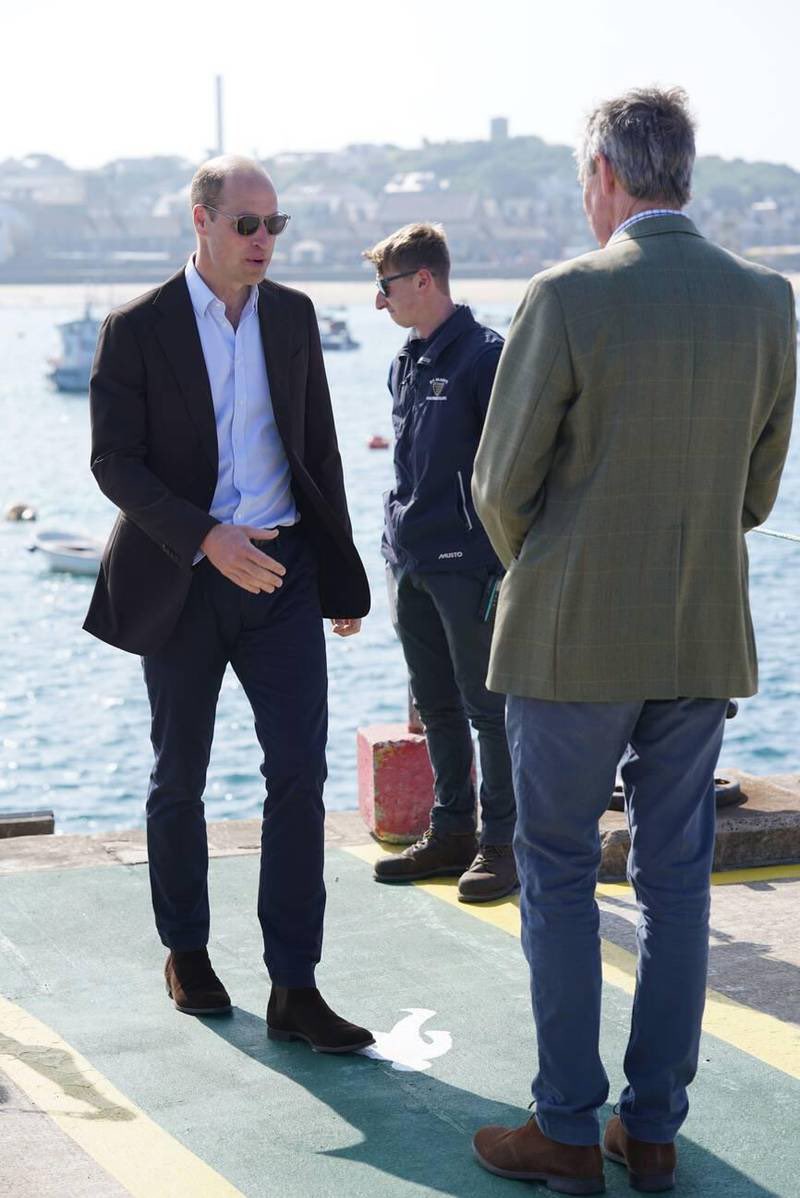 The Prince of Wales, known as the Duke of Cornwall when in Cornwall, during a visit to St. Mary's Harbour, the maritime gateway to the Isles of Scilly, to meet representatives from local businesses operating in the area.