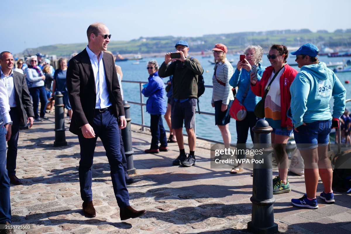 The Prince of Wales talks to members of the public on the Isles of Scilly