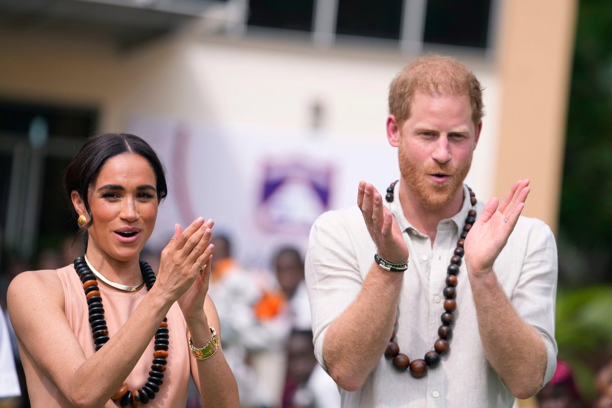 The Duke and Duchess of Sussex visit children at the Lights Academy during their trip to Nigeria to champion the Invictus Games, which he founded to aid the rehabilitation of wounded and sick service members and veterans. Image ID: 2X5J1W0 / Sunday Alamba / AP Photo