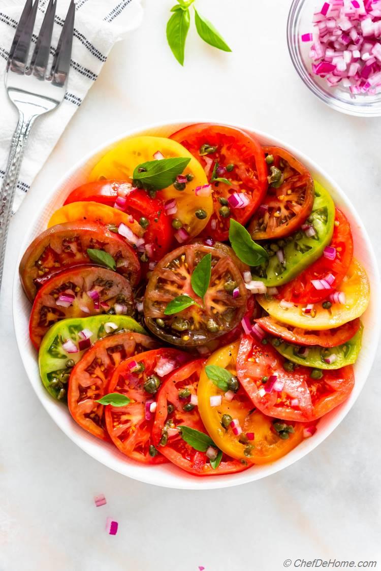 Enjoy a vibrant Heirloom Tomato Salad with fresh basil and sharp Caper Vinaigrette Dressing! This light, clean dish adds a burst of flavor to any meal. #SummerSalad #FreshFlavors

👉chefdehome.com/recipes/960/he…