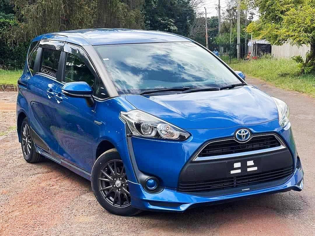 Yesterday a certain client was inquiring details of the Toyota Sienta Hybrid 2016 edition, it's an Automatic version with 1.5cc, 7 seater with a steering control, dvd/fm player also digital AC controls and Xenon lights just mentioned a few. x.com/drivenowug/sta…