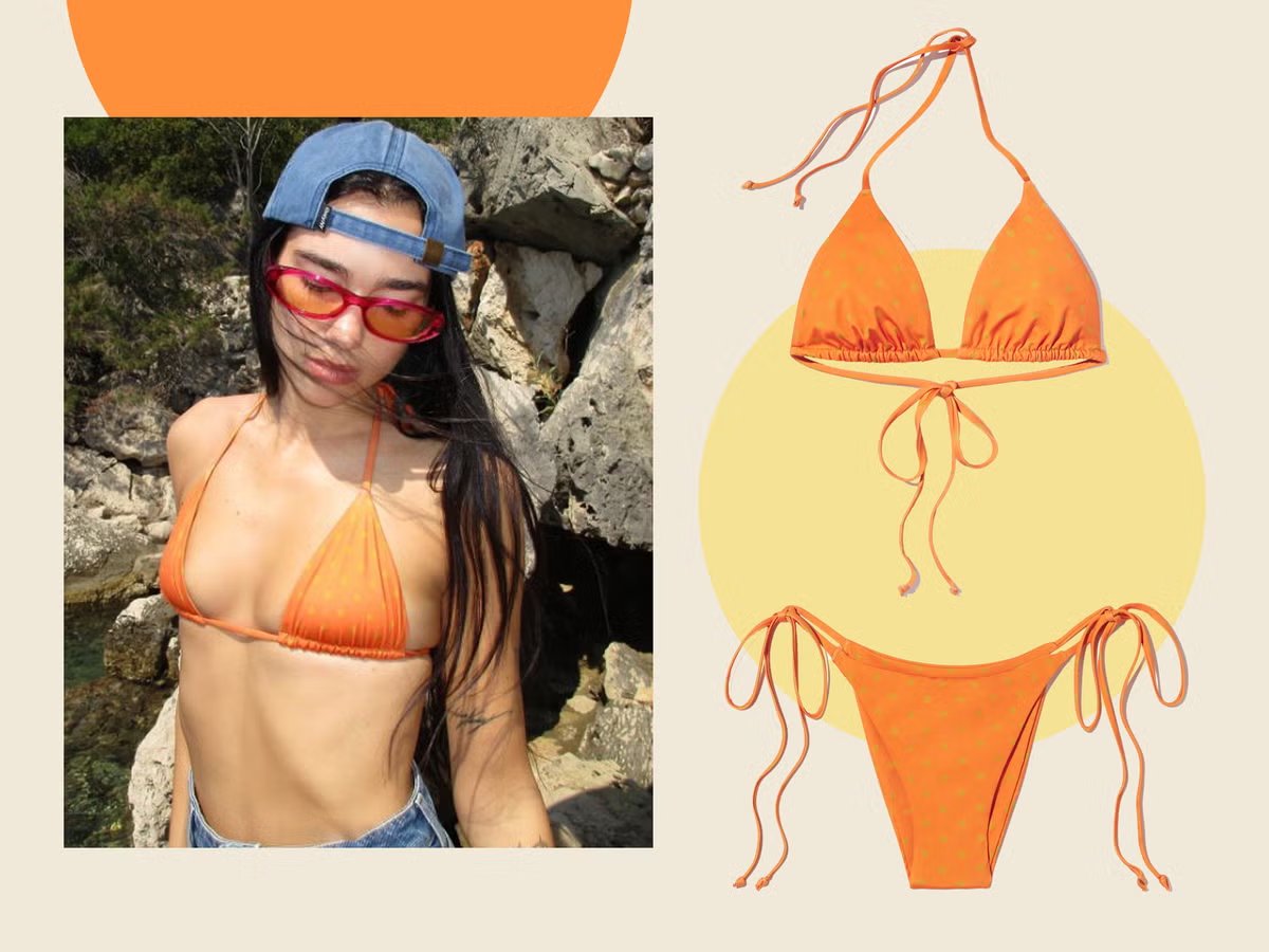 Dua Lipa's sun-soaked beach look in a tangerine polkadot bikini from Inamorata is giving major summer wardrobe inspiration! #StyleInspo #CelebrityFashion independent.co.uk/extras/indybes…