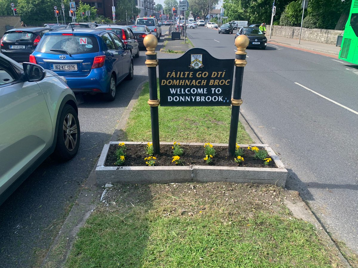 The sunshine graces us today as we enhance the warmth of our Welcome sign at #Donnybrook Village with fresh Summer bedding.  Here comes the sun little darlin.