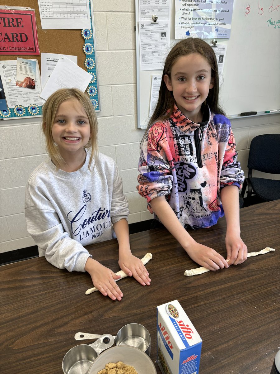 The twisted shape of pretzels is meant to resemble two arms crossed in prayer. Thank you Mrs. Defreyne for making and baking pretzels with the whole school.