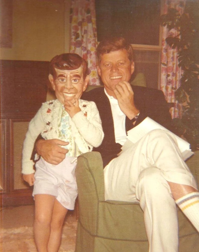 John F. Kennedy and his daughter Caroline on the night of Halloween, 1963