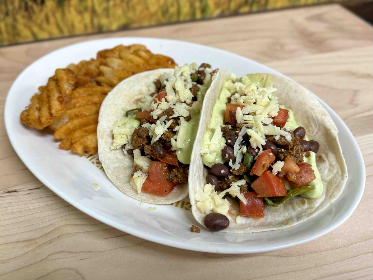 Today only! Stop in and try Sydney’s ground beef tacos topped with black beans, chopped lettuce, tomato, 5-year cheddar and an avocado aioli, served with a side of crispy waffle fries. #weeklyspecials #fridayspecial #stopin #tryit #savemeone #eatlocal #wheresyracuseeats