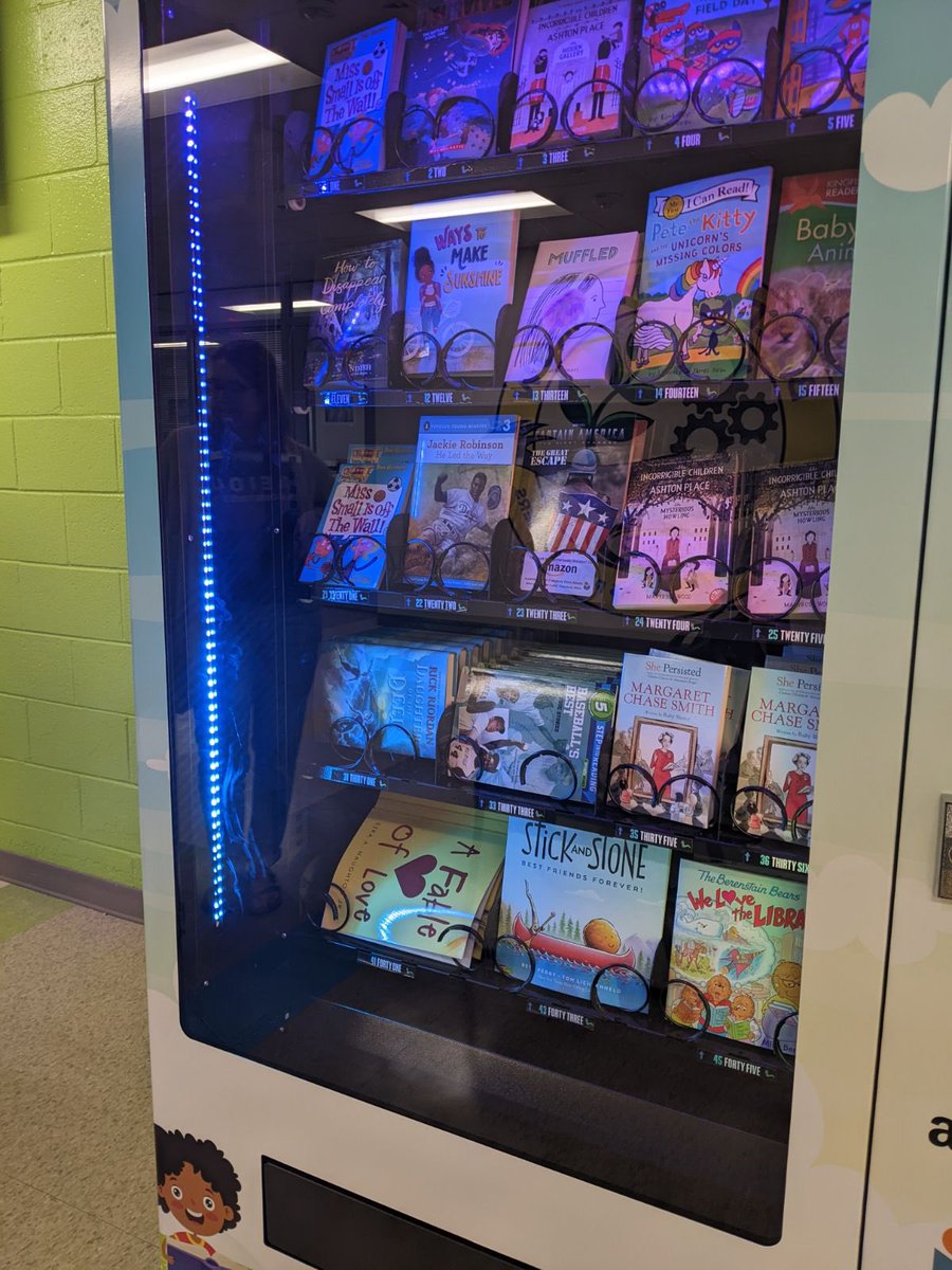 📚 Does your school have a book vending machine? Ours was just  loaded up with fresh reads, and we can't wait to see students dive into them! Share your favorite book vending machine experiences with us! 📖💫 #ReadingIsFun #BookVending