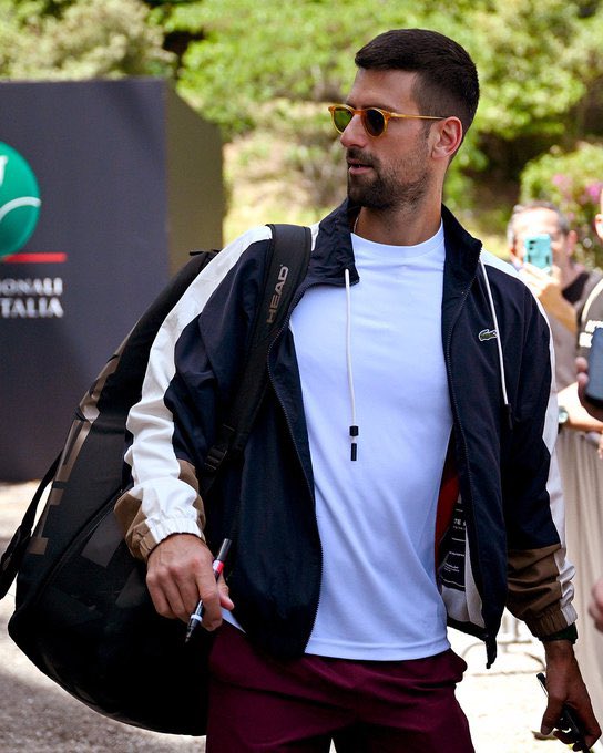RottenKnee23's tweet photo. Siri, show me the coolest man on the planet. 

#Djokovic 😎 #Nolefam 🐊 #IBI24 https://t.co/MjW5z7kyS6