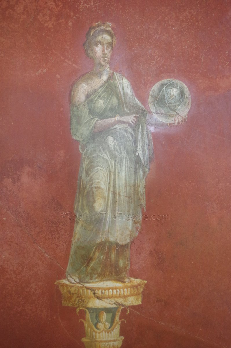 #FrescoFriday, a painting of the Muse Urania, identifiable from the globe she's holding, from a triclinium in a villa at Moregine, south of #Pompeii. Now displayed in the Grand Palaestra at Pompeii. #Archaeology #RomanArchaeology #Italy