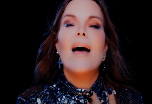 Former NIGHTWISH Vocalist ANETTE OLZON Releases Music Video For New Solo Single 'Hear My Song' blabbermouth.net/news/former-ni…