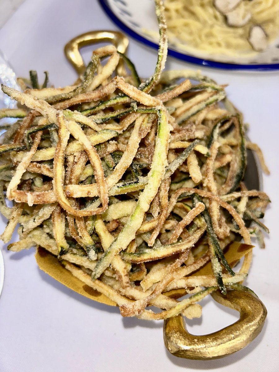 Last light meal in Florence. So good—truffle pasta—zucchini fries and a very nice Pinot Blanco and Chardonnay blend. Perfect for a hot day on the piazza.