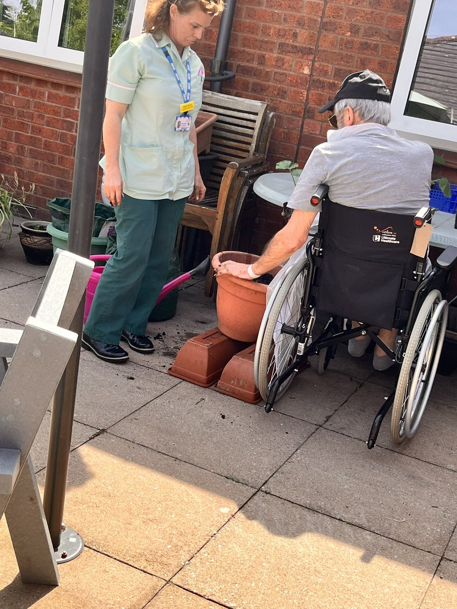 Enjoying the sunshine! Summer at SNRC means that therapy sessions, ward rounds and lunch can take place in the patients garden. A much loved space by all staff and patients.