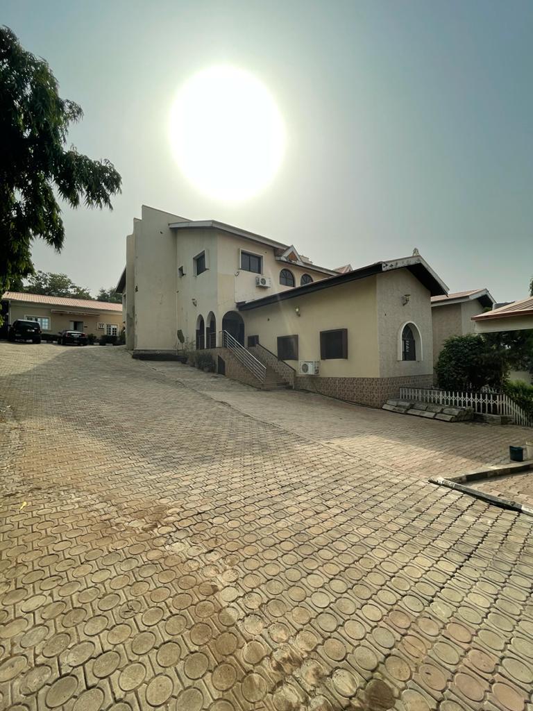 FOR SALE:
8 Bedroom masterpiece in the heart of Abuja. 
LOCATION: Asokoro Main
Title:C of O
Landsize ~ 1869.46 sqm
Luxury 8 bedroom Duplex  with 4 living rooms. 
- Well designed flow to synchronize with the topography of the land. 
-Security doors
-swimming pool
-Gym etc
#Abuja