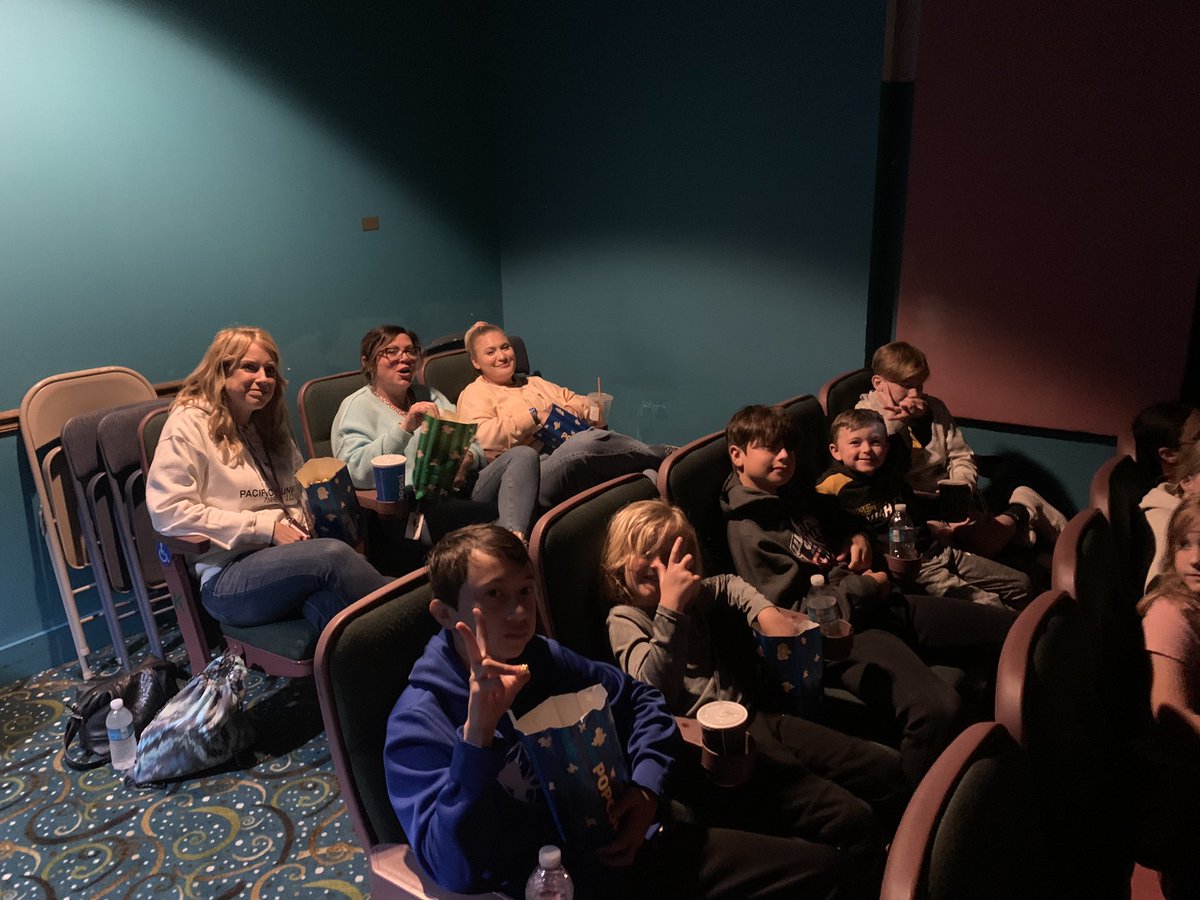 Ross Elementary takes the MOVIES!!🍿🎥🎬 Lights, Cameras, ACTION!! Students are having a blast & well deserved!So cool to see the whole school bond together! Kinderbuddies bused together and are sitting together! Amazing stuff! HUGE thanks to our PTO!#Knight_Vision3 @RossElemPTO