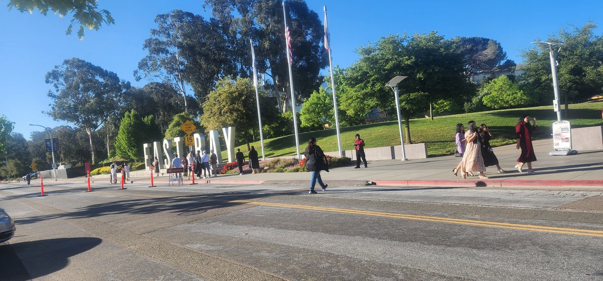 Graduates and families taking grad photos by the Letters. Gonna be a great day. Three commencements today! Best time of year! So proud! @CalStateEastBay @calstate @DiversityCSUEB