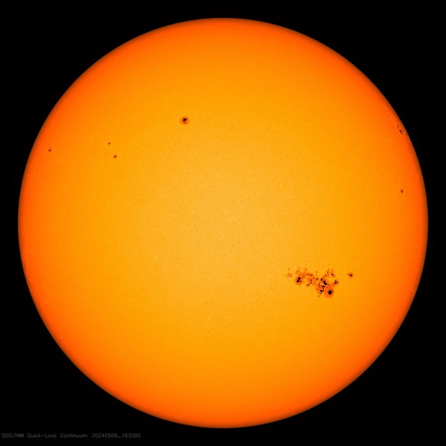 Sunspot causing all of the solar storminess and aurora potential is so big you can safely see it using your eclipse glasses (if the sun is out where you are) in the sun's southwestern hemisphere. This is known as active region 3664.