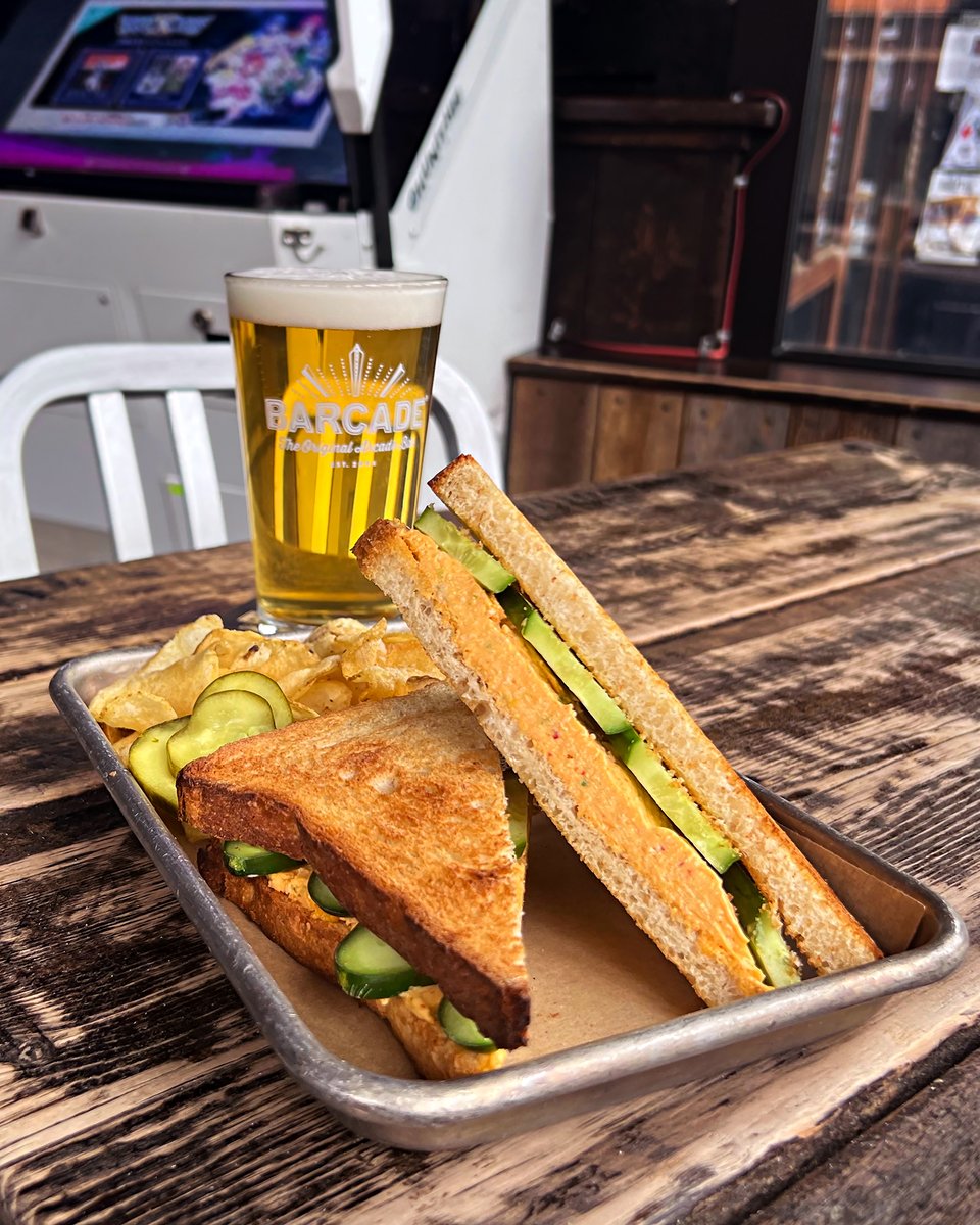 🧀 The “Kimcheese Toasty' is two slices of toasted sourdough sandwiching a schmear of housemade vegetarian Kimcheese and sliced cucumbers. #Barcade #JerseyCity #NJ