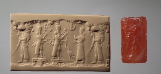 Given the popularity of carnelian, it is not surprising that it is also used in making cylinder seals. Here we see a detailed scene of two worshippers standing between two gods. It clearly shows the talent of the engraver. 
A27904,carnelian, Iraq, Neo-Assyrian period(934-612 BCE)