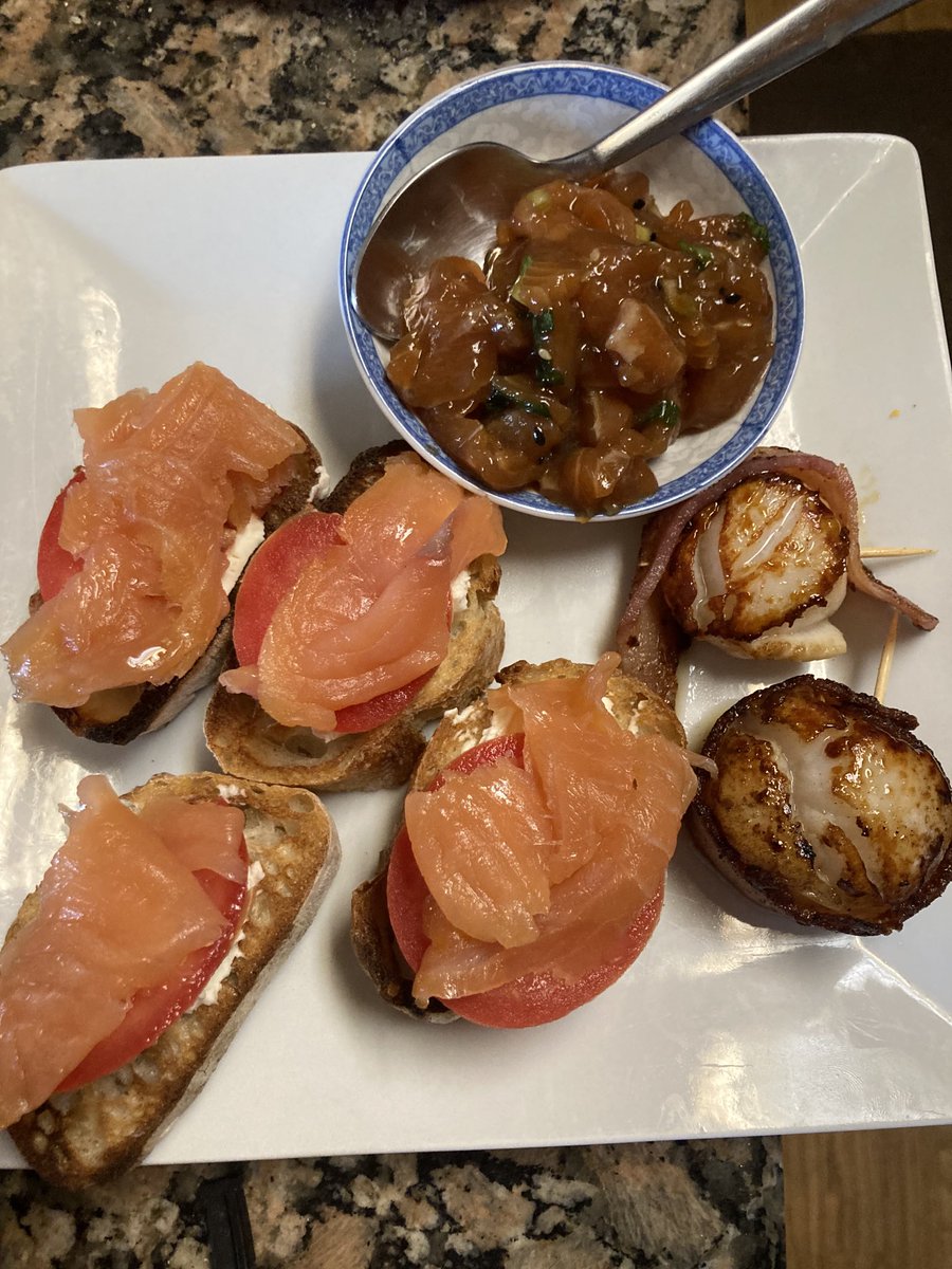 Seafood trio Smoked salmon with tomato slice and cream cheese on toasted baguette Salmon poke Seared sea scallops wrapped in pecan wood smoked bacon #WhatAmICooking