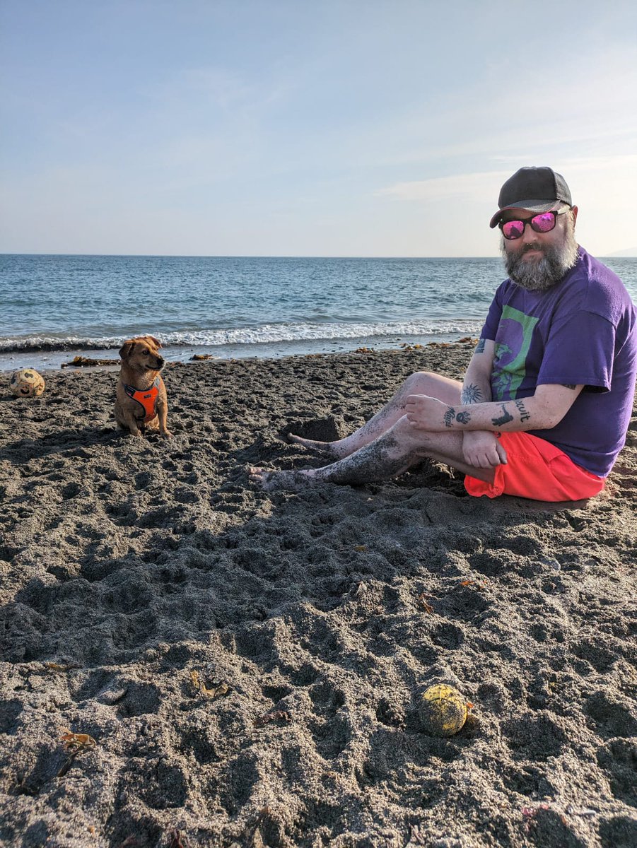 Beach bum and his dog