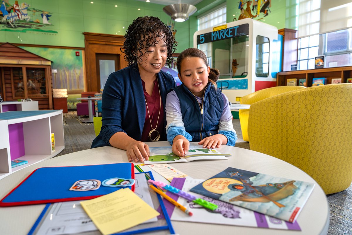 Happy Mother's Day! We hope that all the amazing moms out there are having a day as special as they are. 🌷 #DYK: Reading to young children is an important way to help them build language skills? 📚 📷: Toledo Lucas County Public Library