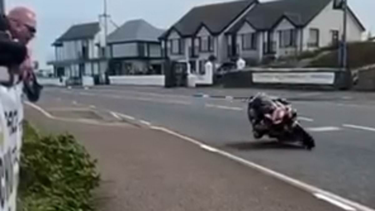 Terrifying moment biker crashes at high speeds into a barrier and somersaults 25ft into the air - before walking away unscathed trib.al/GbdGJFN