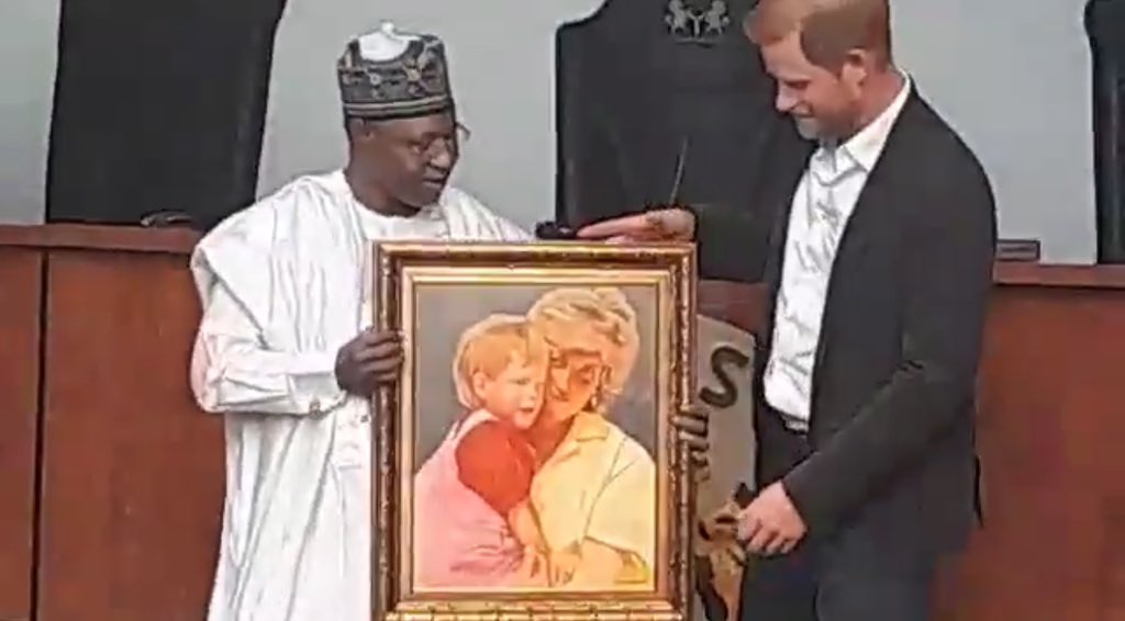 The Governor of Kaduna State Presenting Prince Harry with a portrait of him and his mother Princess Diana.