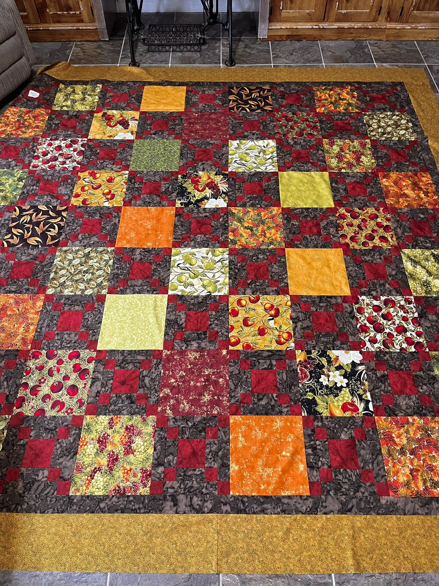 Borders are on the quilt and I’ll take it to the longarmer next week. The nearly plain coloured blocks stick out from the rest but once they’re quilted, they will blend better. Washing will crinkle them, blending further. 1/2