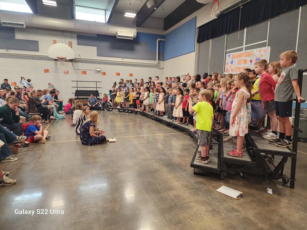 1st Graders' Blooming Into Spring Concert at Bamber Valley Elementary! The cafeteria is packed, and the students are doing an amazing job. So wonderful to watch their performance. Go, Beavers!